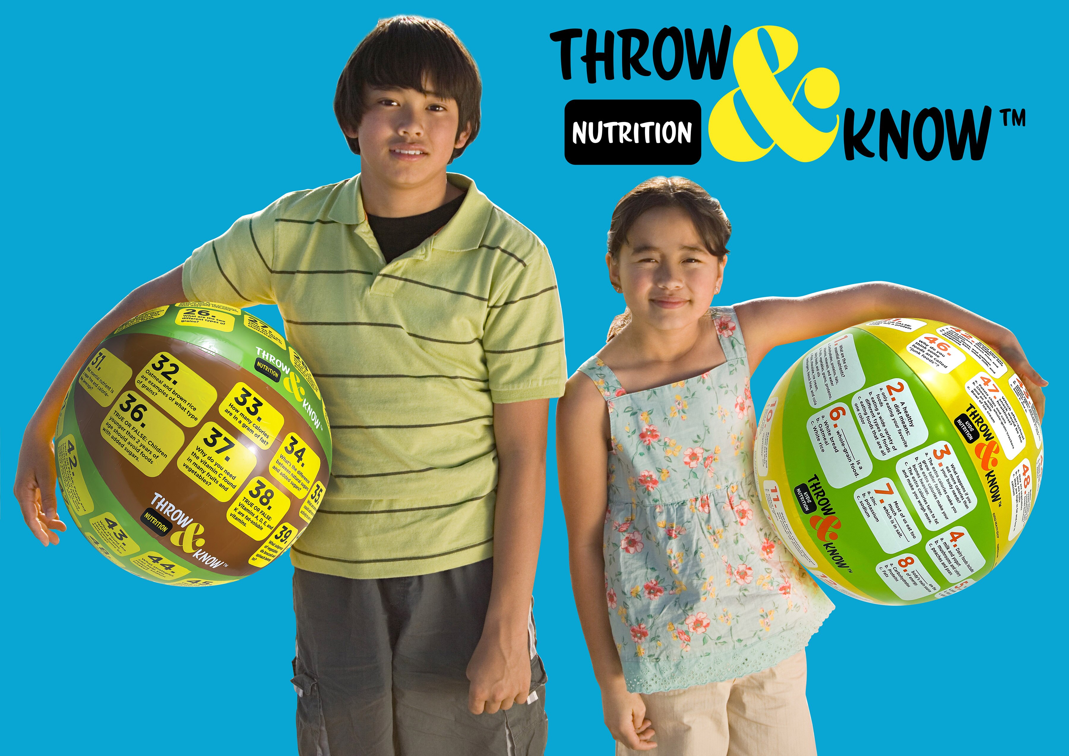 Kids Holding Health Edco’s Nutrition Throw & Know Activity Ball and Kids Nutrition Throw & Know Activity Ball